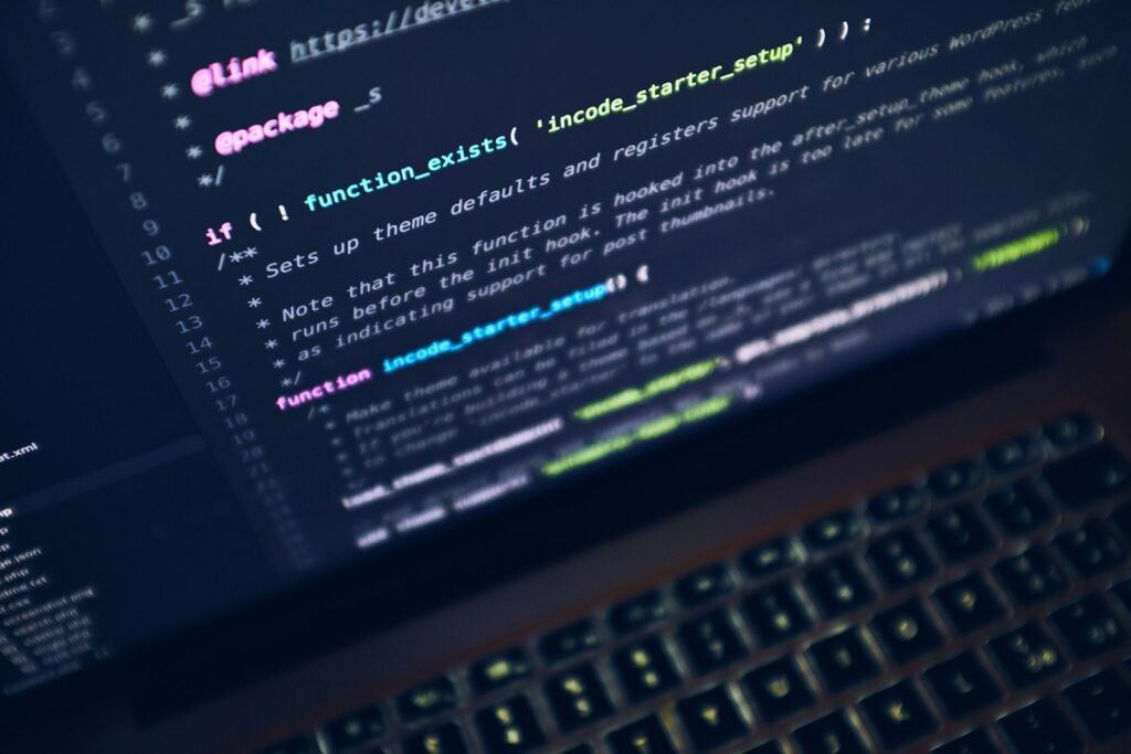 Code on a laptop screen — custom website design and development