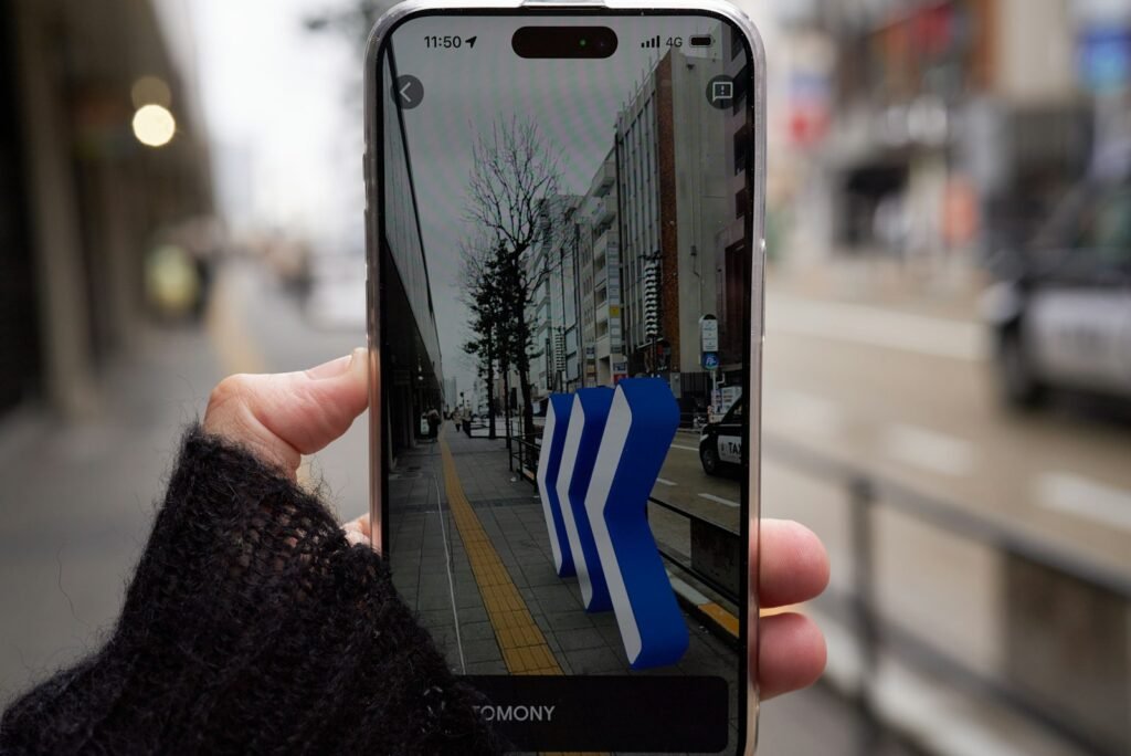 Someone using a phone map on a busy street, representing local search and the map pack